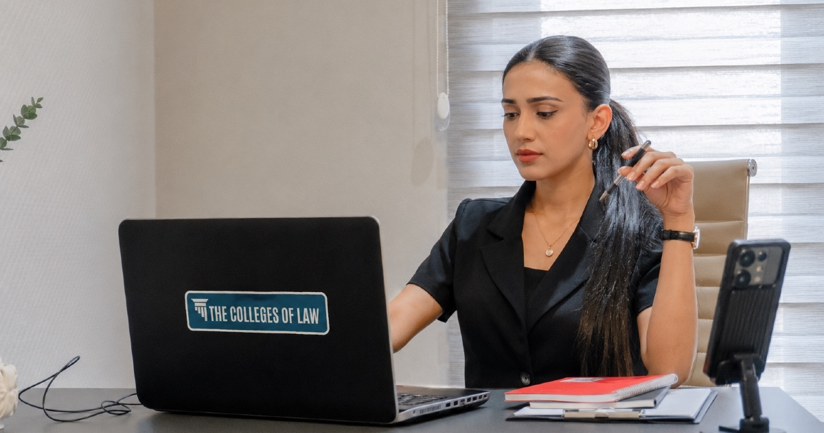 Woman looking at laptop screen